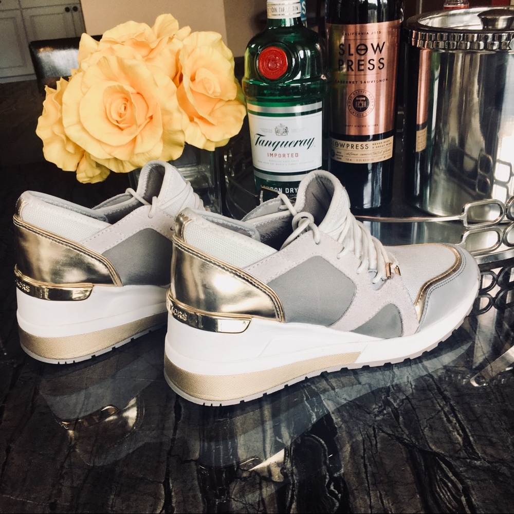 Michael Kors top of the line wedge sneakers.